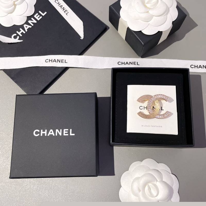 Ch*el brooches